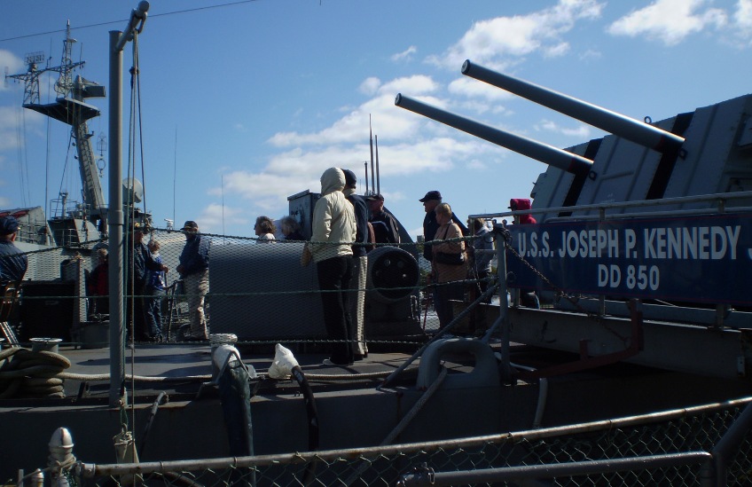 Arriving for the memorial service aboard the USS Joseph P. Kennedy (DD-850)