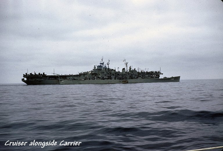 USS Bremerton (CA 130) alongside carrier